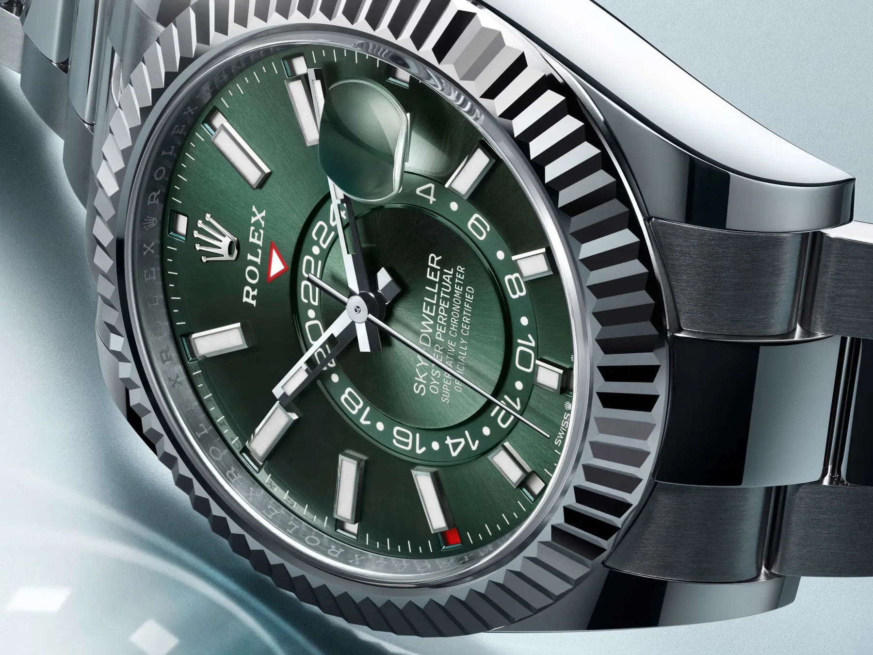 Rolex watch with a green dial and fluted bezel